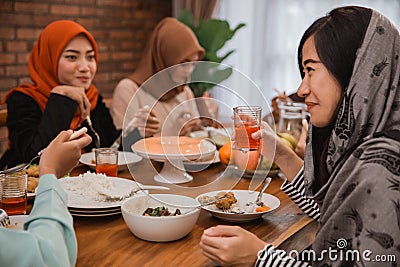 Muslim people having dinner break fasting together Stock Photo