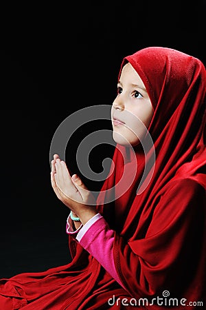 Muslim pray, little girl Stock Photo