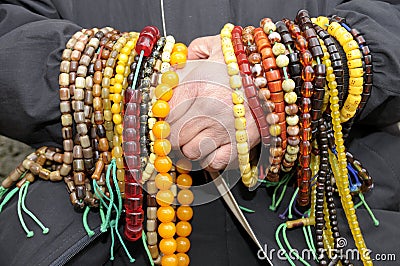 Muslim with prayer beads Stock Photo