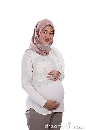 Muslim pregnant woman asian Stock Photo