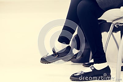 Muslim students wearing uniform sitting in a classroom Stock Photo