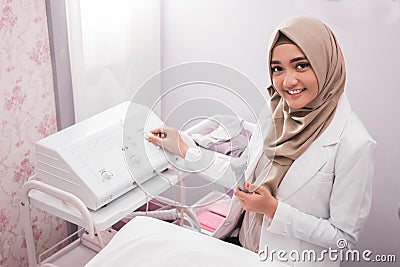 Muslim woman beautician doctor Stock Photo