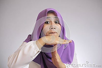 Muslim Woman Making Time Out Gesture Stock Photo