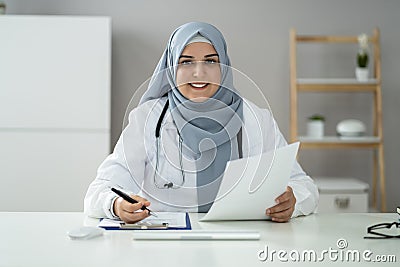 Muslim Woman Physician Doctor Video Conference Stock Photo