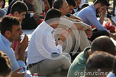 Muslims celebrating Eid al-Fitr Editorial Stock Photo