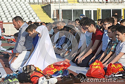 Muslims celebrating Eid al-Fitr Editorial Stock Photo