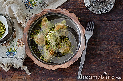 Mussel shaped special Turkish baklava with pistachio Stock Photo