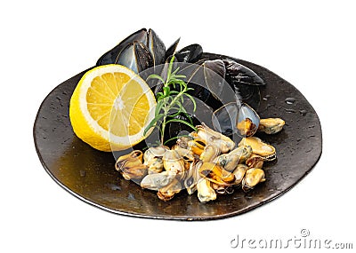 Mussels Pile on Black Plate Isolated, Open Shellfish, Seafood, Mussels Meat, Cooked Clams on White Stock Photo