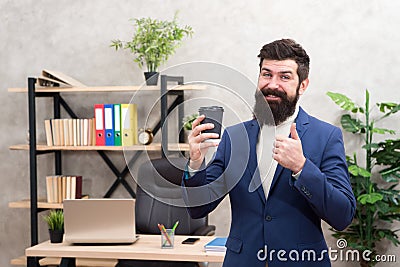 Must have stimulant for him. Man bearded manager businessman entrepreneur hold cup of coffee. Relaxed cheerful top Stock Photo