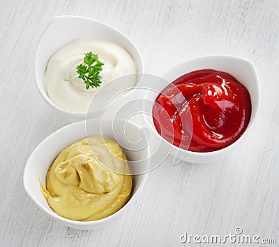 Mustard, ketchup and mayonnaise Stock Photo