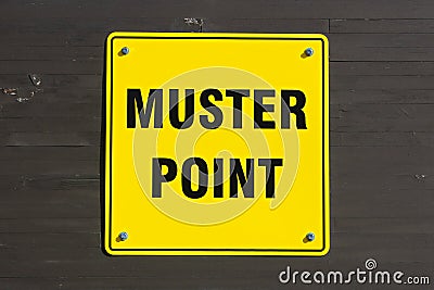 Muster point sign on a wall Stock Photo