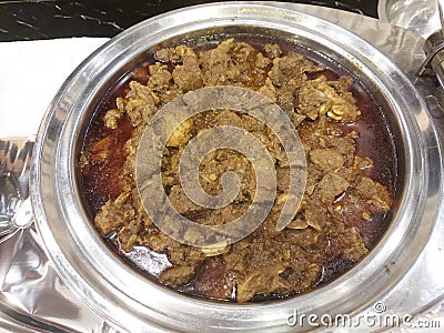 Mutton curry in a big bowl ,prepared from goat meat Stock Photo