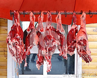 Mutton hanging at a farmers` market, adobe rgb Stock Photo