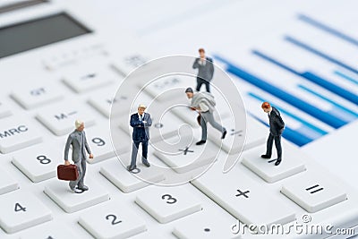 Mutual funds, business performance success, profit and loss in accounting or company management concept, miniature people figurine Stock Photo