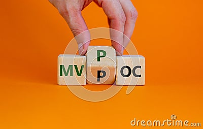 MVP vs POC symbol. Businessman turns the cube. changes words MVP, minimum viable product to POC, proof of concept. Beautiful Stock Photo
