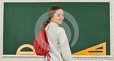 My backpack is just right. Girl in school classroom copy space. School project. Clever teenager student. Educative Stock Photo