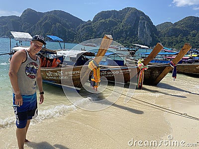 Handsome guy at the beach Editorial Stock Photo