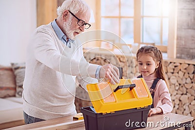 Nice professional locksmith opening his box Stock Photo