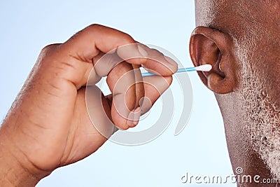My kind of depth. Studio shot of an unrecognizable man scratching his ear against a blue background. Stock Photo