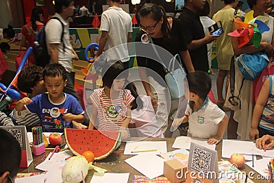 My mother taught children drawing in the SHENZHEN Tai Koo Shing Commercial Center Editorial Stock Photo