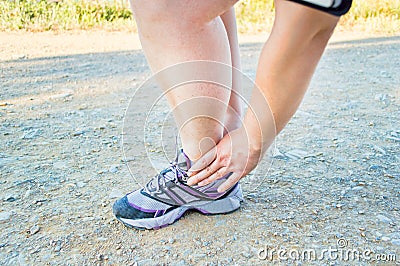 My twisted ankle is painful Stock Photo