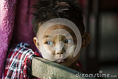 Myanmar - child with Thanakha make up Editorial Stock Photo
