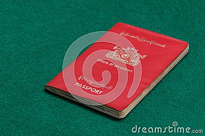 Myanmar passport on green table Stock Photo