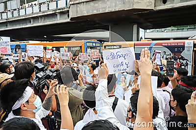 Myanmar protesters joined thai protesters protest at Pathumwan Intersection Editorial Stock Photo