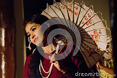 Myanmar Umbrella Dancer Editorial Stock Photo
