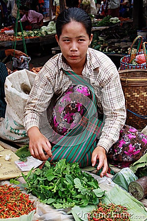 Myanmar woman selling vegetables at the market Editorial Stock Photo