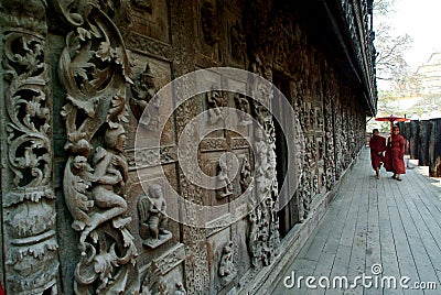 Myanmar young monks walking at Shwenandaw Monastery in Mandalay. Editorial Stock Photo