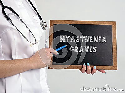MYASTHENIA GRAVIS inscription on the black board Stock Photo