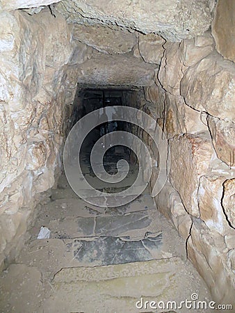 Mycenae, descent into the dungeon Stock Photo