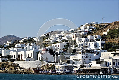 Mykonos, white houses, tourism and Greek island Editorial Stock Photo