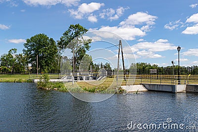 Mylof Zapora, pomorskie / Poland - May, 29, 2019: A small dam on the Brda River. Water accumulation on the river giving rise to a Editorial Stock Photo
