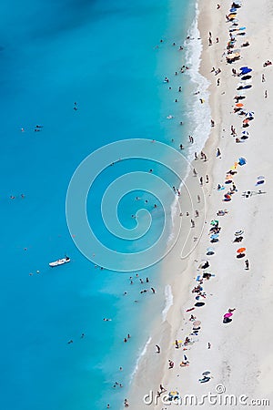 Myrtos beach with people, Kefalonia island, Greece Stock Photo