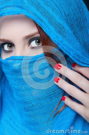 Mysterious female model with stylish makeup Stock Photo
