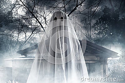 Mysterious ghost on haunted house Stock Photo