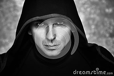 Mysterious Man in Black Hoodie. Fantasy Guy. Stock Photo