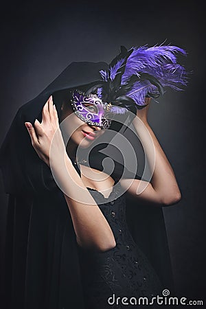 Mysterious masked woman Stock Photo