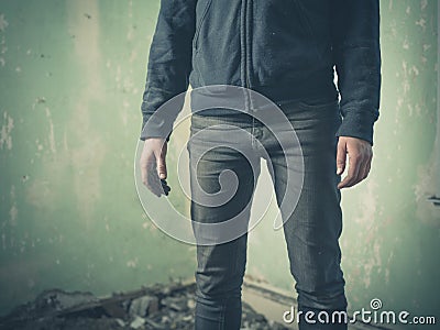 Mysterious person in derelict room Stock Photo
