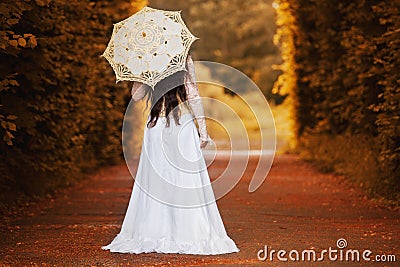 Mysterious woman in Victorian dress Stock Photo