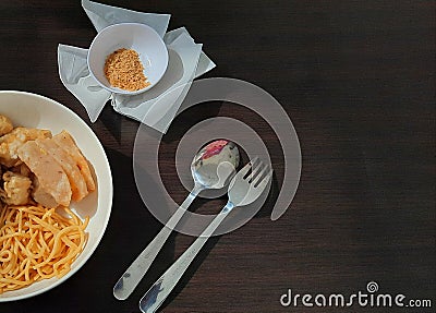 the mystery of the dish on the dark dining table Stock Photo