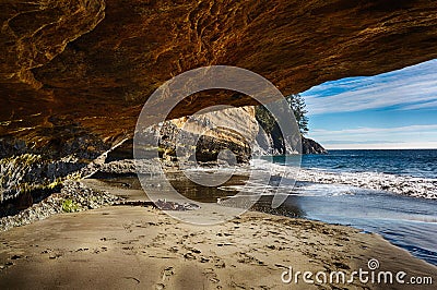 Mystic Beach Cave Stock Photo