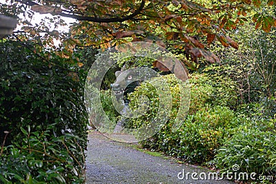 Mystic dragon in a garden Stock Photo