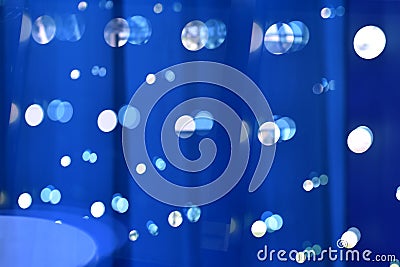 Mystic lights reflecting in glass surface, bokeh. Stock Photo