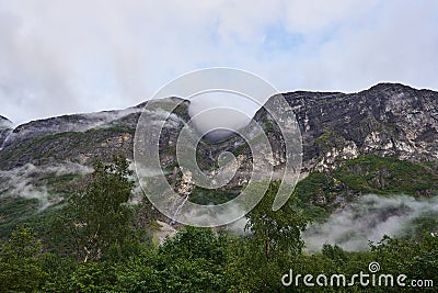 Mystic morning in the norwegian mountains after the night rain. Stock Photo
