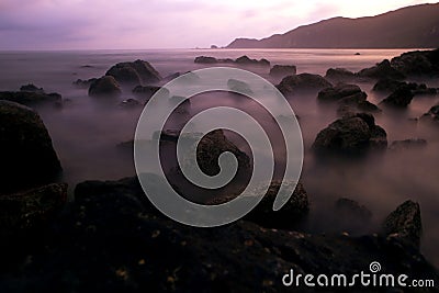 Mystic rocks in the ocean Stock Photo