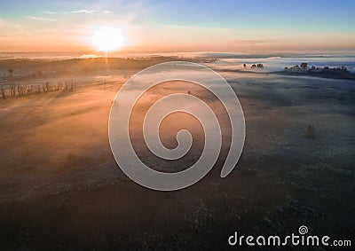 Mystical foggy dawn. space atmosphere. COld autumn valley mood Stock Photo