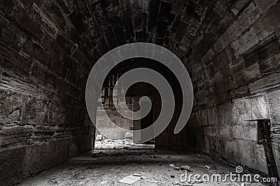 Mystical interior of dark corridor in an old abandoned palace Stock Photo